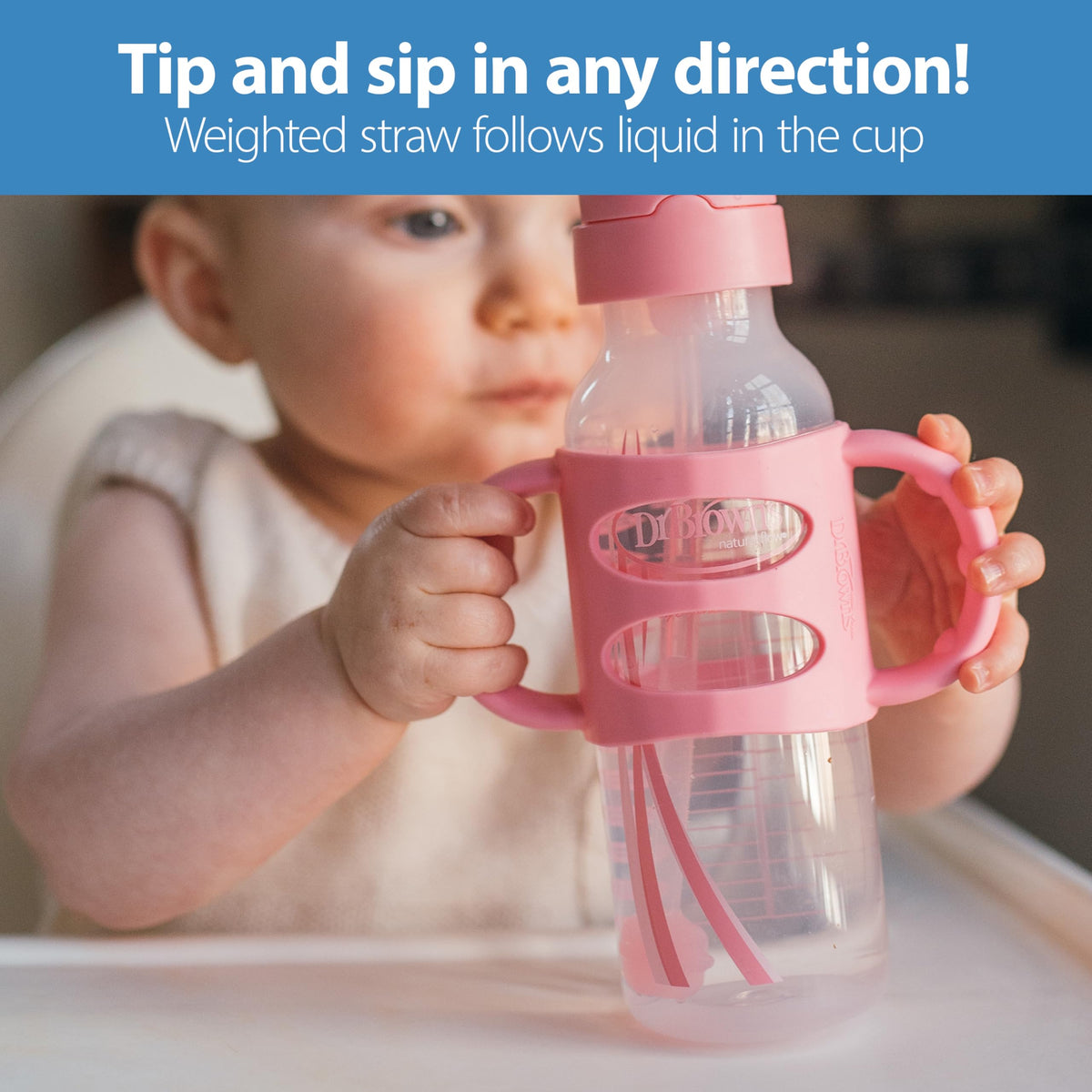 Dr. Brown's sippy bottle with pink and gray silicone handles