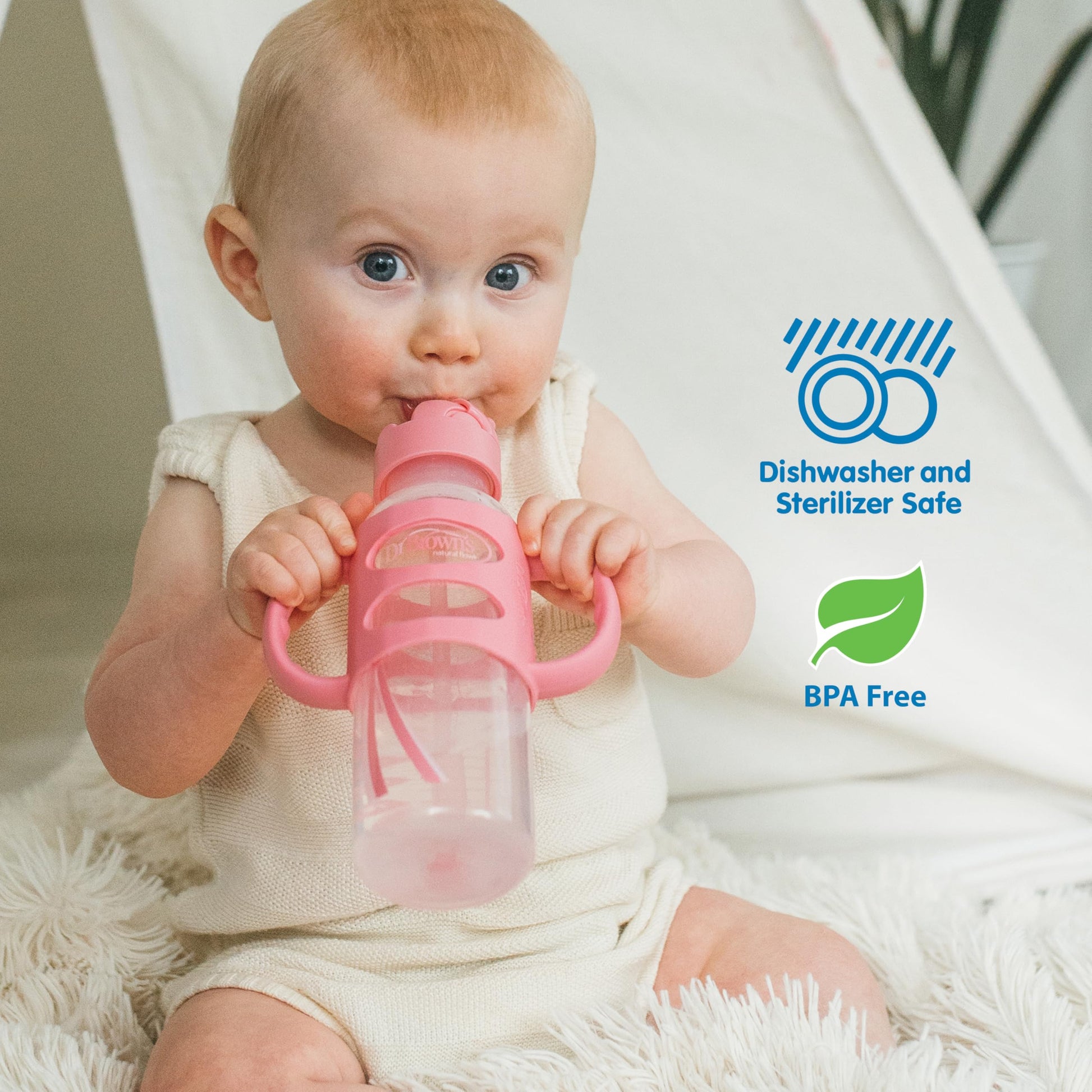 Close up of ergonomic silicone handles on baby bottle