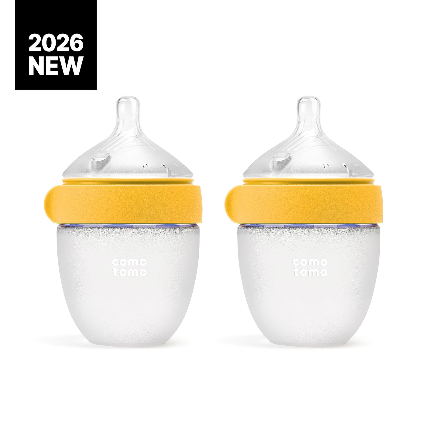 Comotomo five ounce silicone feeding bottles in yellow showcasing the squeezable medical grade material.