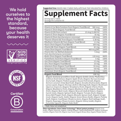 Garden of Life organics women's daily nutritional supplement bottle resting on clear display surface