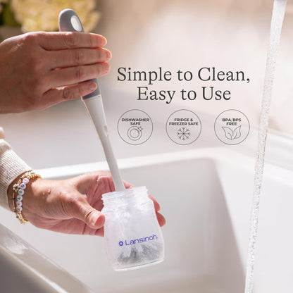 Lansinoh BPA free plastic feeding bottle held at feeding angle