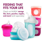 Side view of Boon Nursh pink silicone baby bottle
