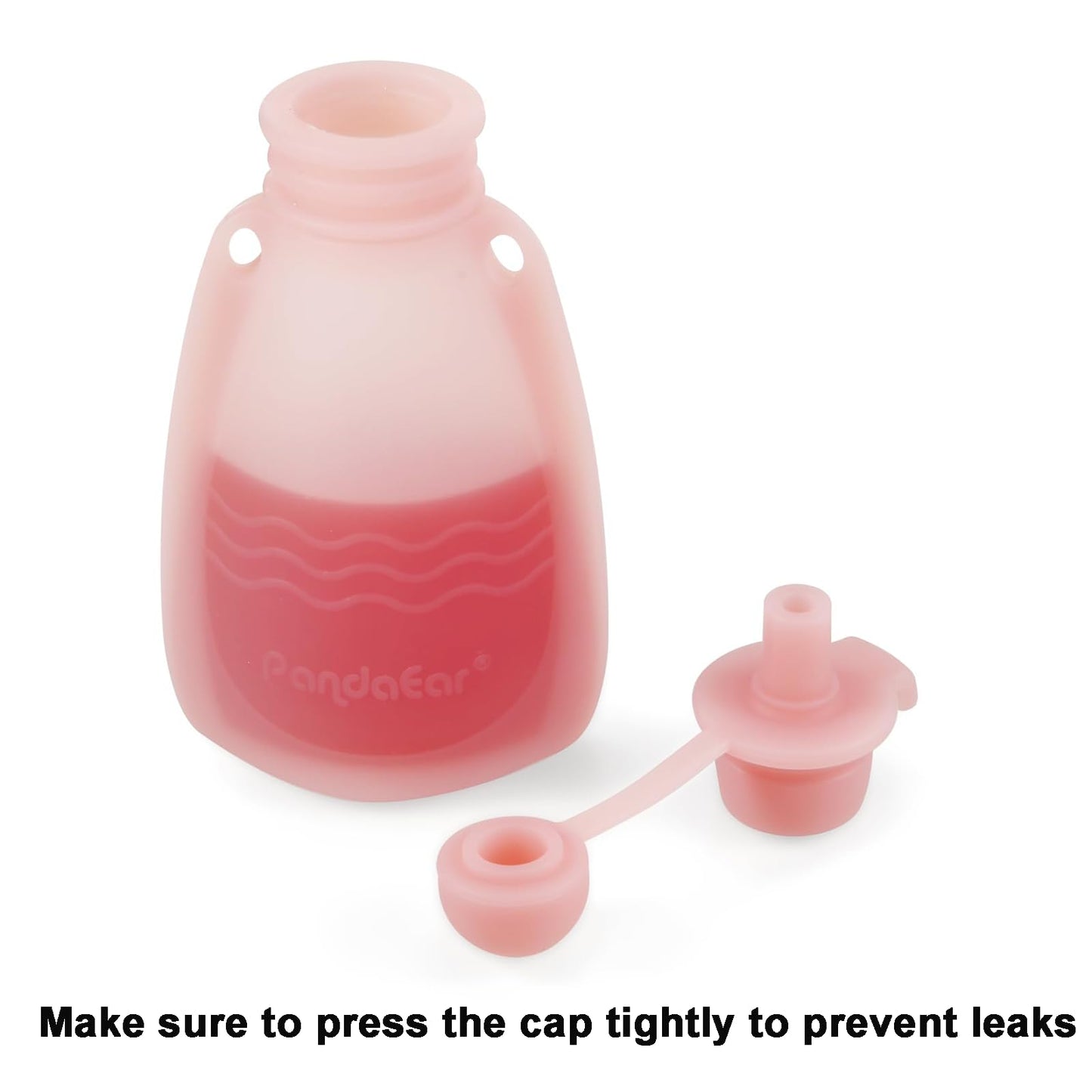 Hand holding PandaEar silicone food pouch with puree