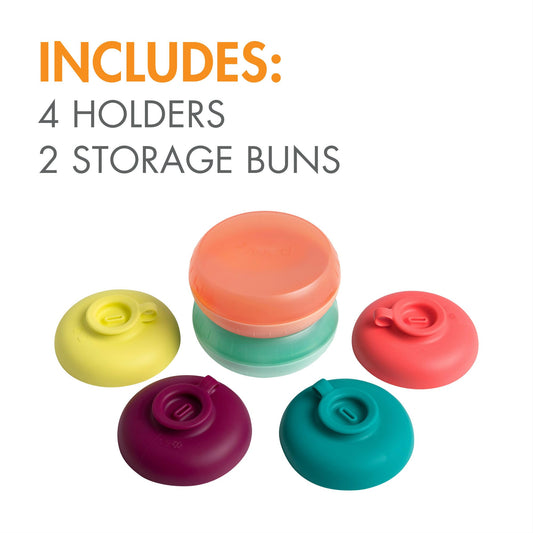 Boon Drizzle silicone drip catcher holding a popsicle