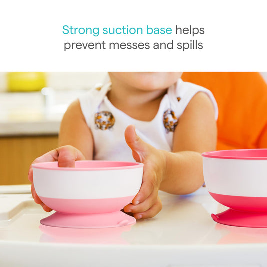 Three Munchkin suction bowls in pink and purple colors