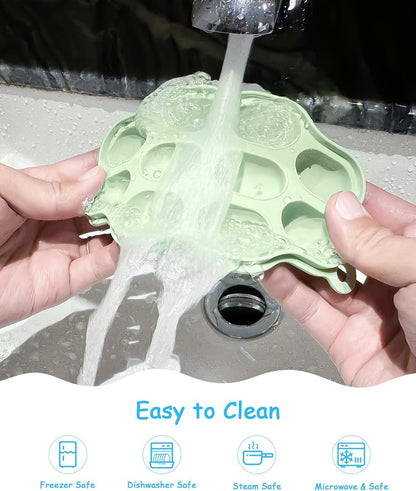 Silicone baby food tray with lid in kitchen setting