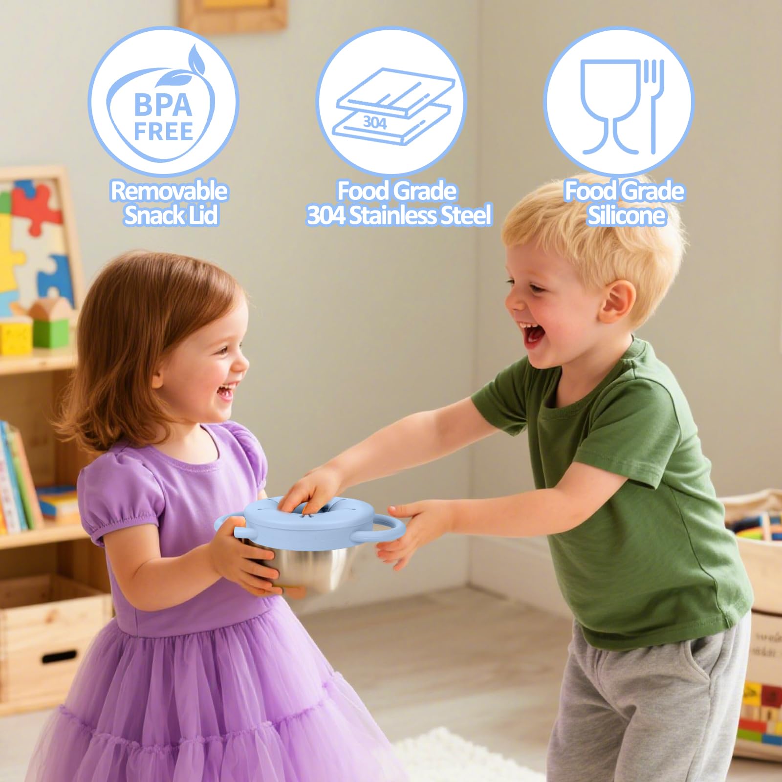 Toddler using Theoni stainless steel snack cup handles
