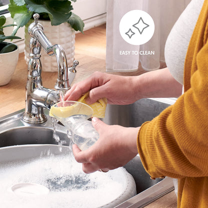 Medela silicone milk collector showing 100 milliliter capacity scale