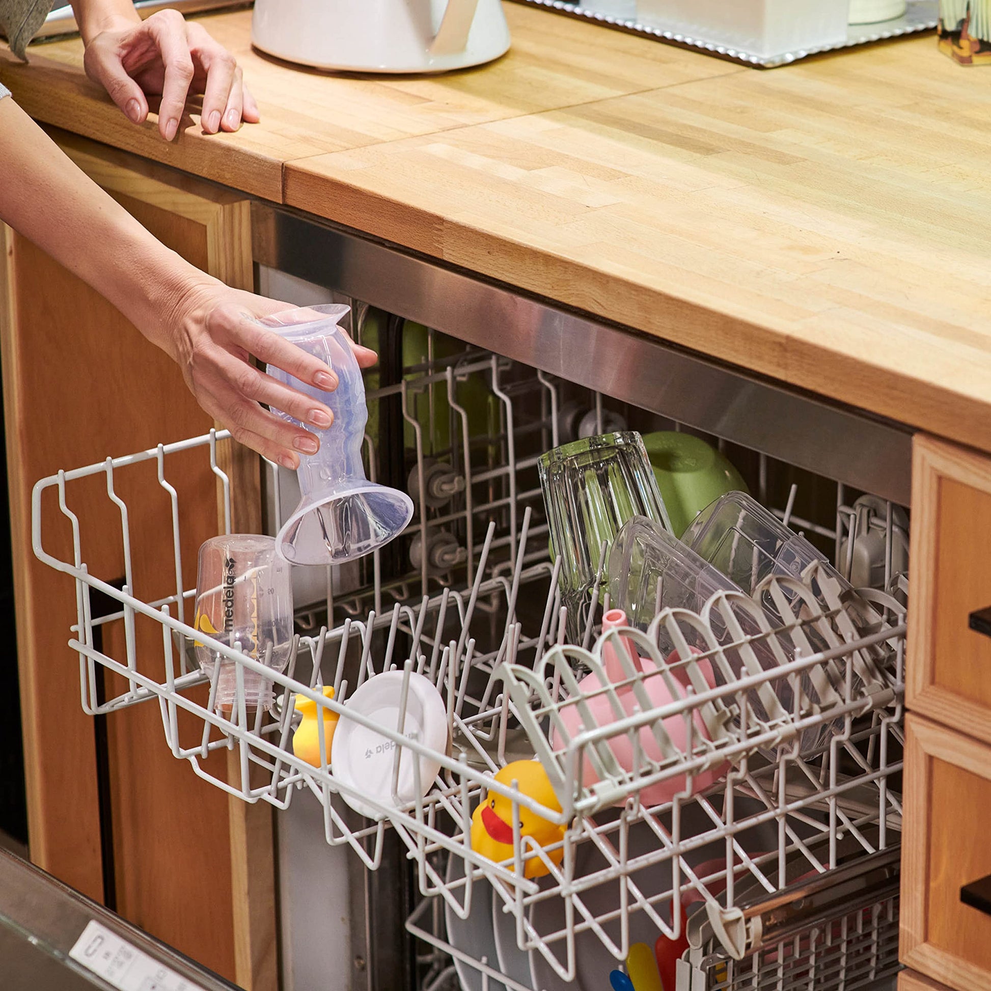 Side profile of Medela silicone breast milk collector