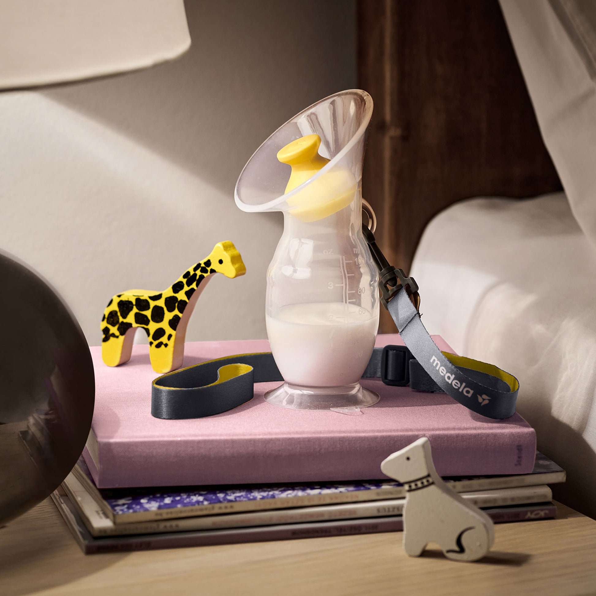 Packaging and contents of Medela silicone breast milk collector