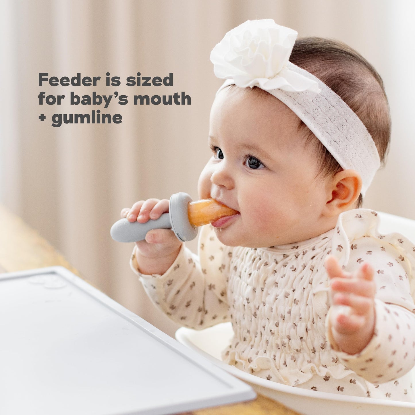 Top view of ezpz gumline feeder sage handle