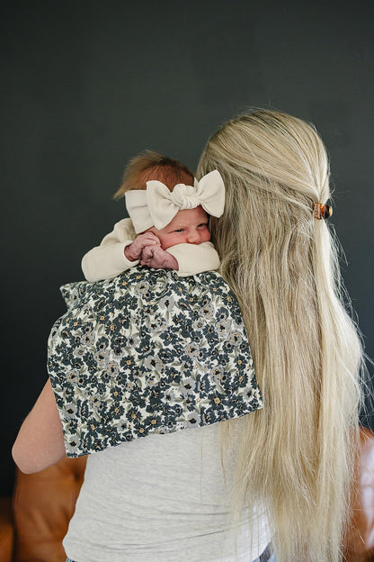 Folded Mebie Baby burp cloths stack