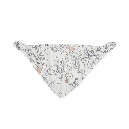 Baby wearing woodland animal print bandana style bib