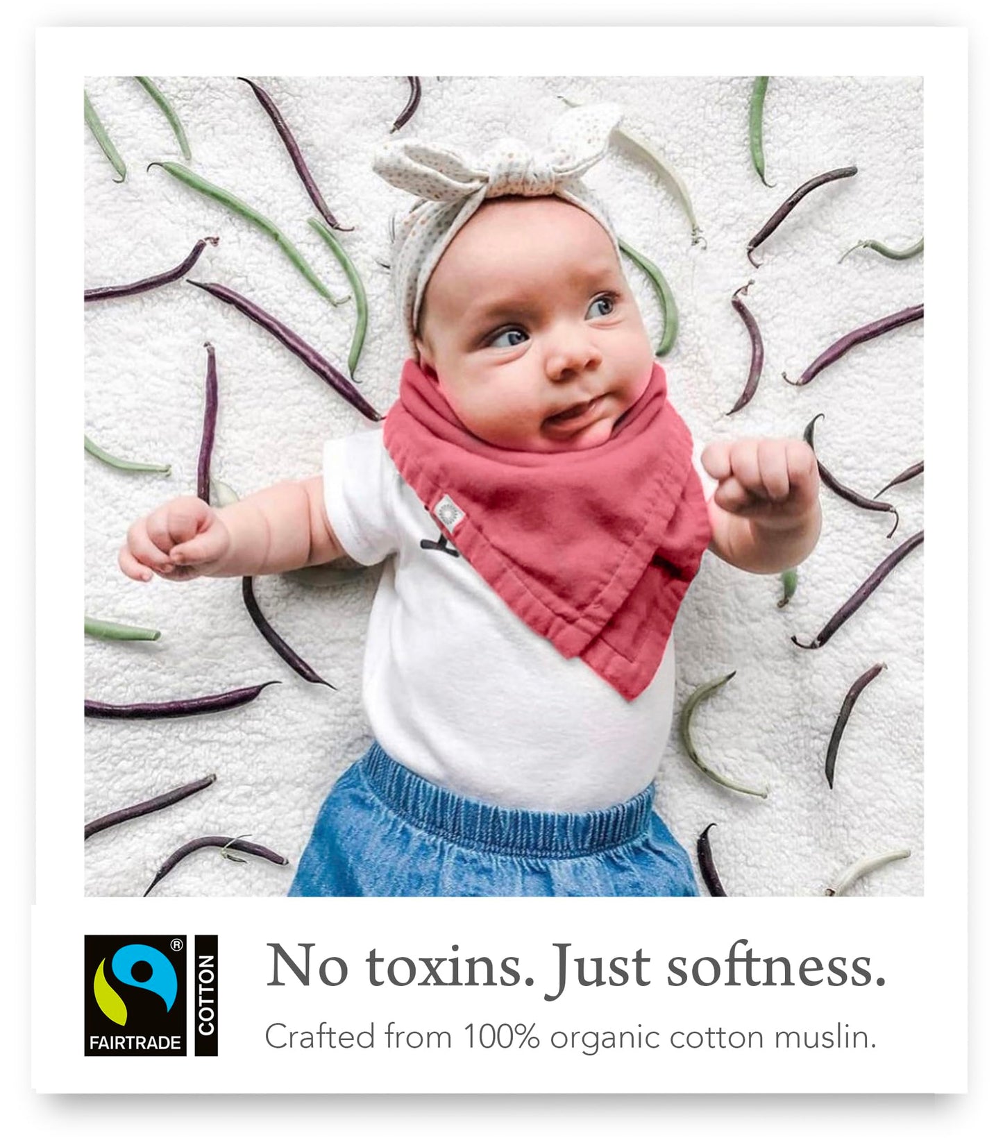 Close up of Kishu Baby organic muslin fabric texture and snap details