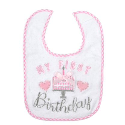 Infant wearing Baby Essentials festive bib and matching accessory