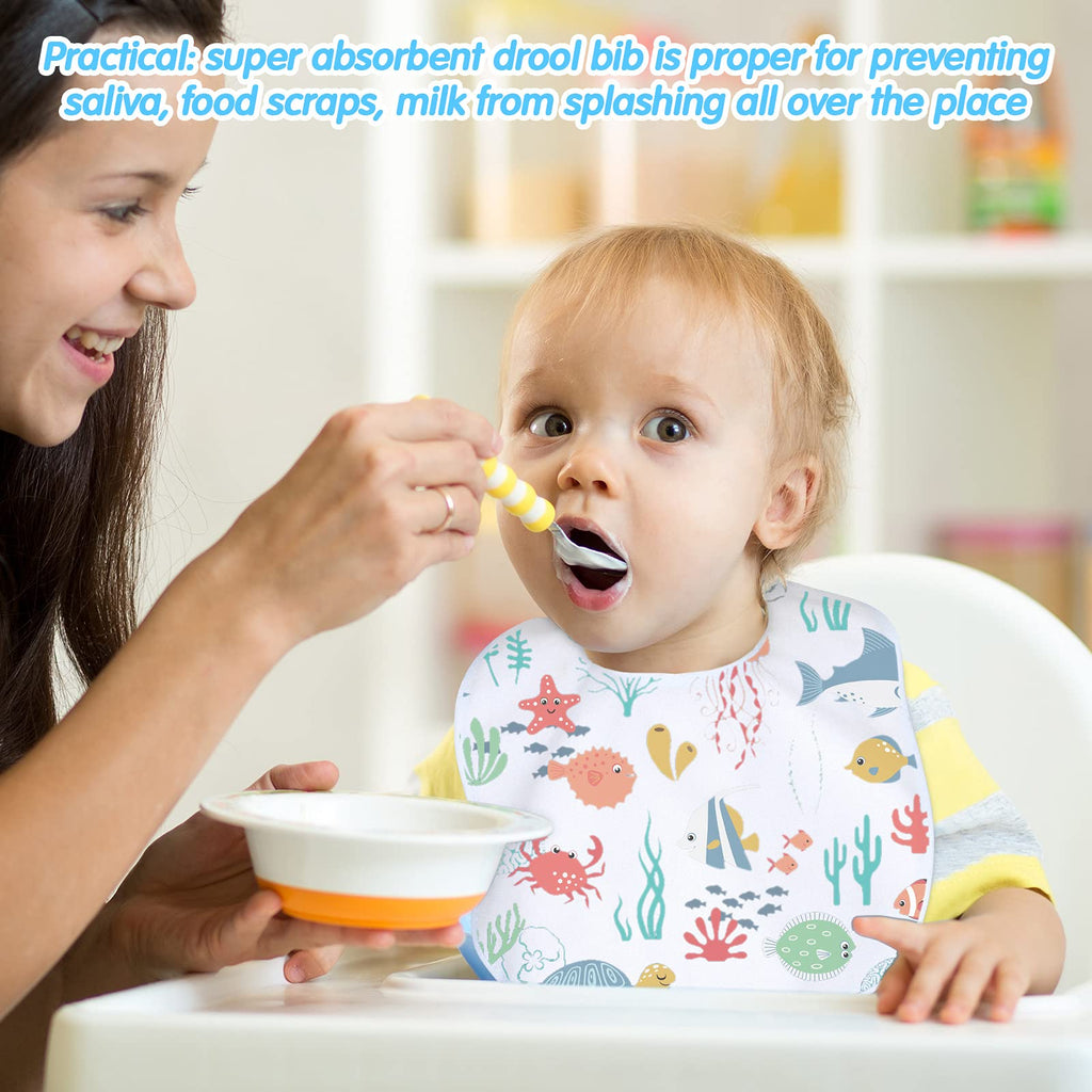Baby wearing white HooLing feeder drool bib