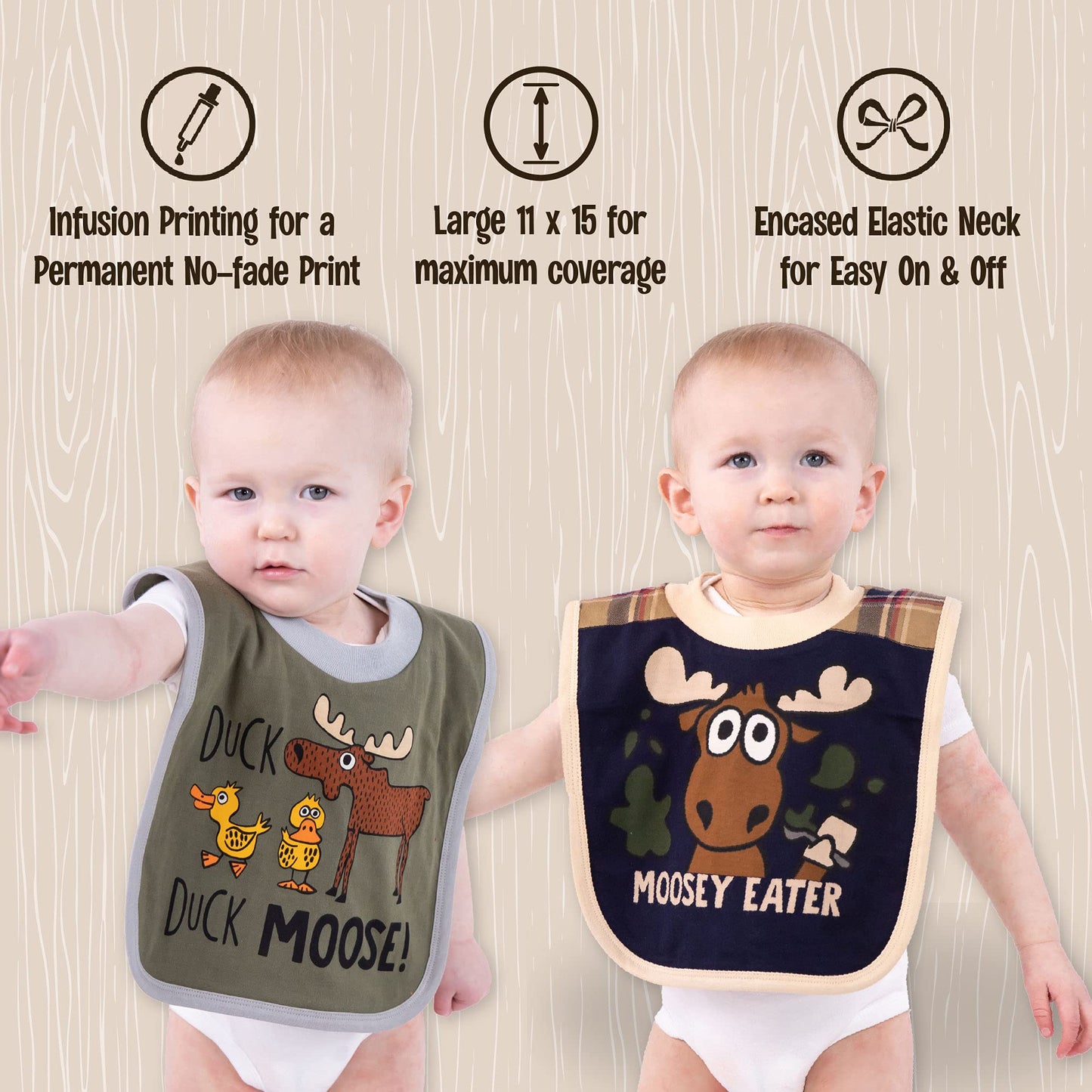Infant wearing Lazy One animal print bib during meal time