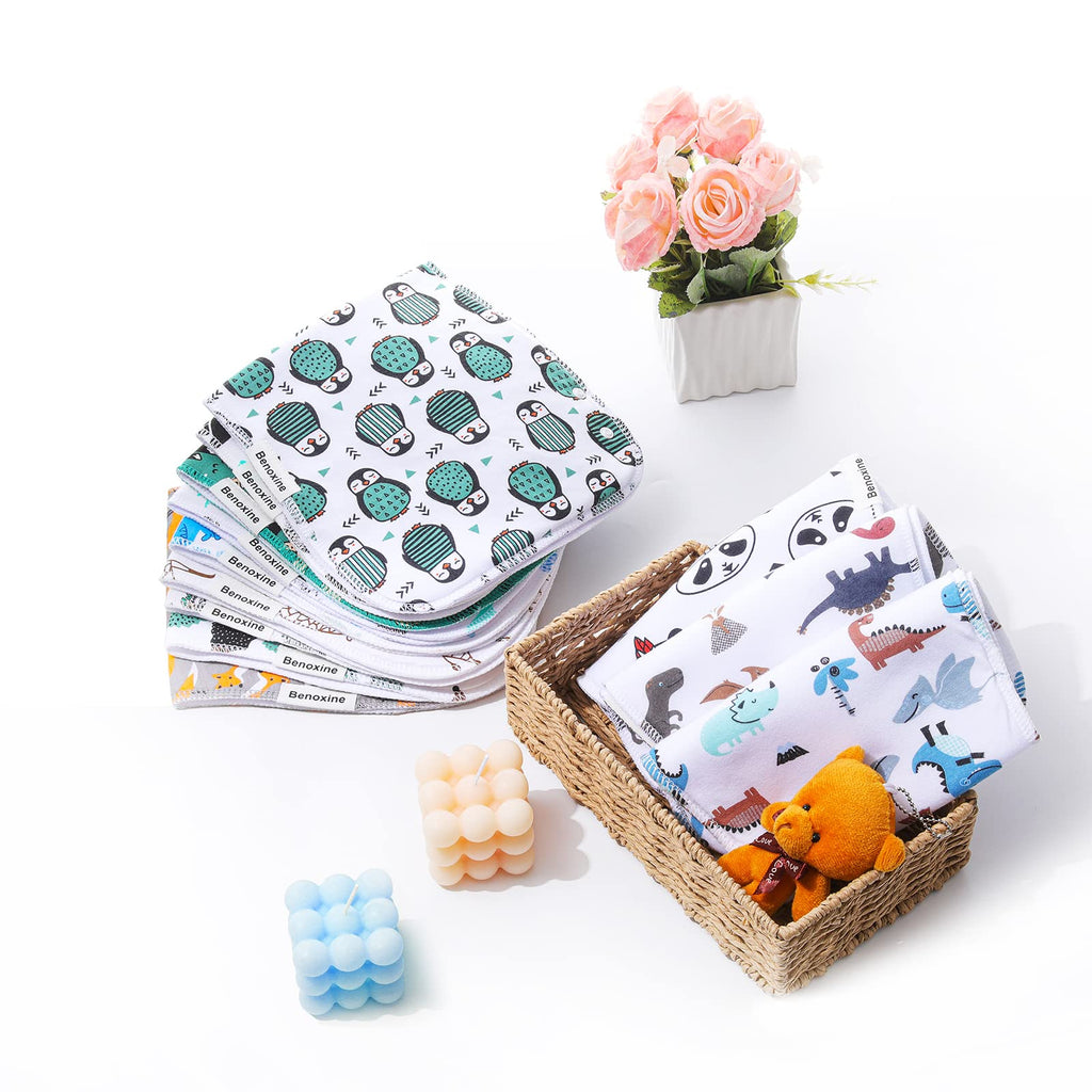 Folded soft cotton baby burp cloths in a travel bag