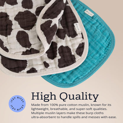 Set of 2 baby burp cloths in cow print and coordinating teal color