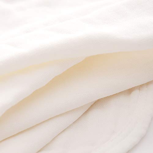 Stack of five white Mukin muslin newborn burp cloths
