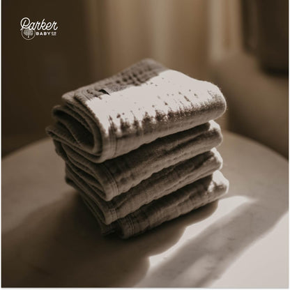 Parker Baby burp cloth being used for newborn clean up