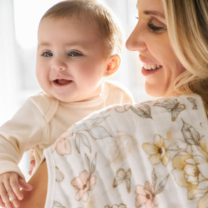 Aden + Anais burpy bib used as a shoulder burp cloth