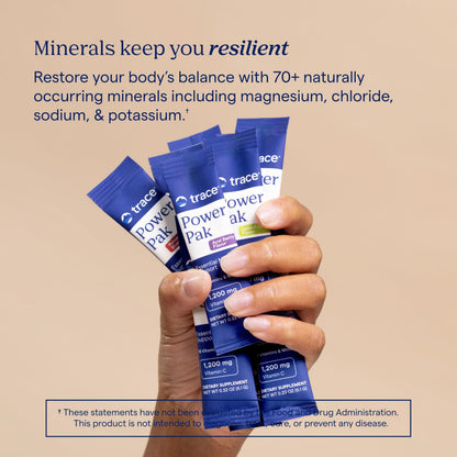 Trace Minerals immunity and electrolyte supplement stick packets spread out on a table.