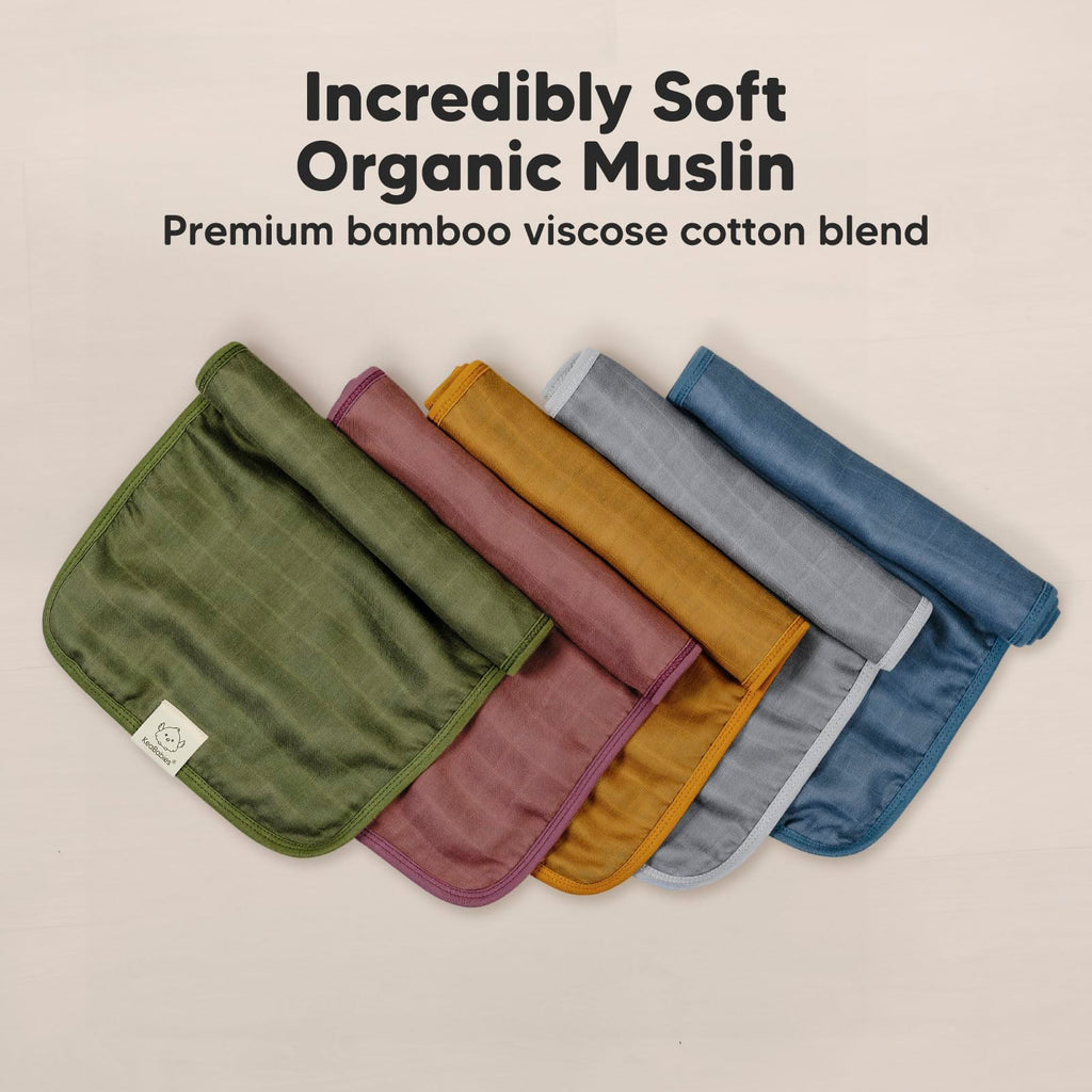 KeaBabies muslin burp cloths draped over shoulder
