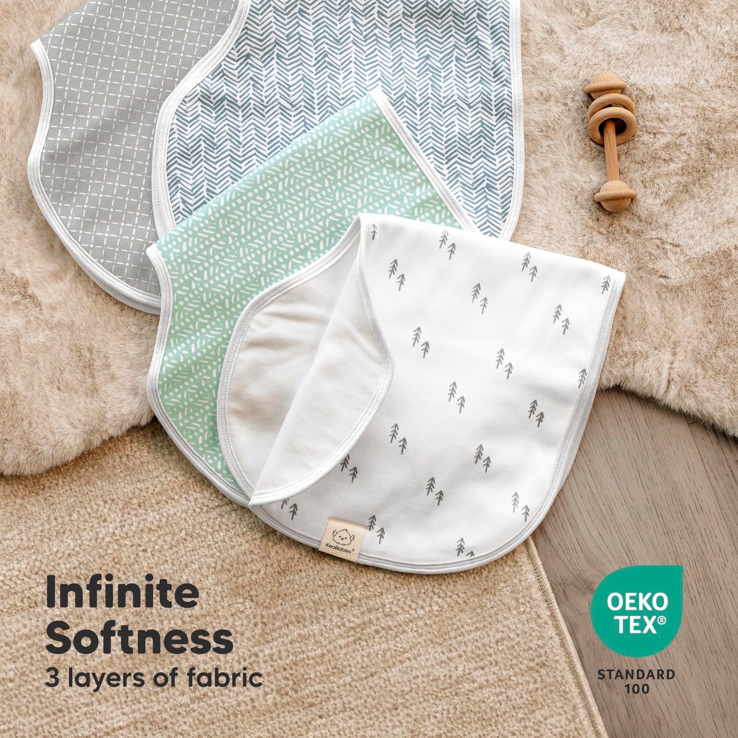 Showing the size and shoulder coverage of KeaBabies burp cloth