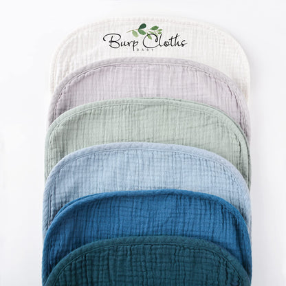 Soft muslin cotton cloths folded in nursery setting