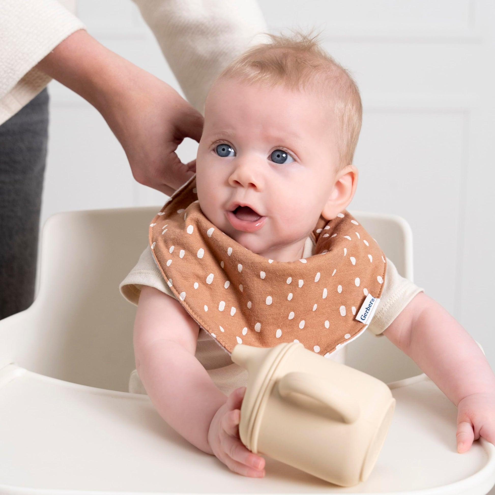 Close up of soft cotton jersey and fleece fabric on Gerber baby bibs