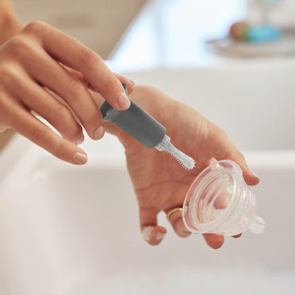 Munchkin bottle brush with integrated nipple cleaning tool
