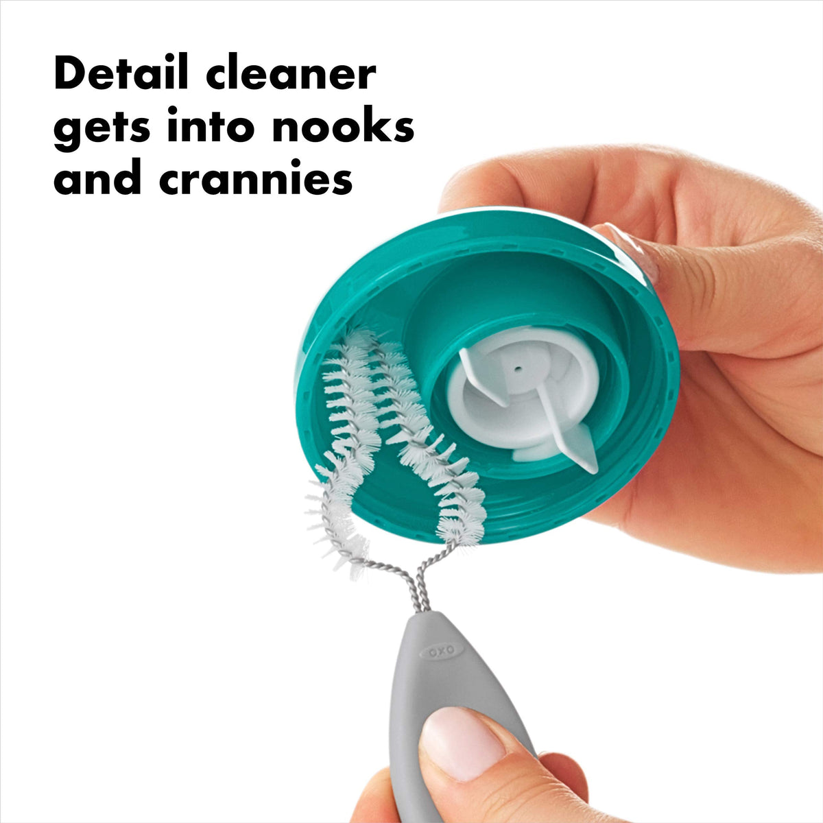 Detailed view of the OXO Tot detail brush for tight corners