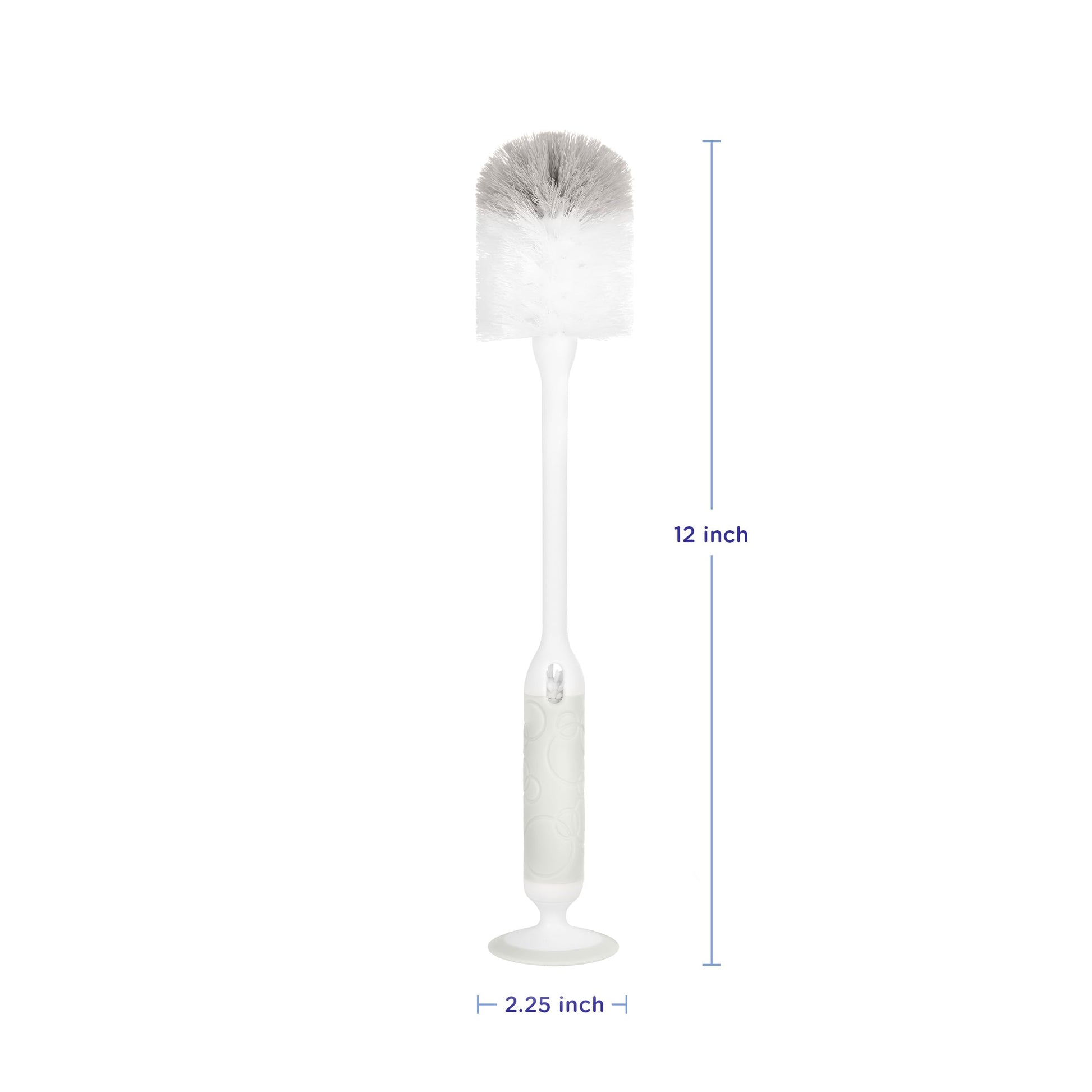 Ubbi bottle brush with suction cup base standing on counter