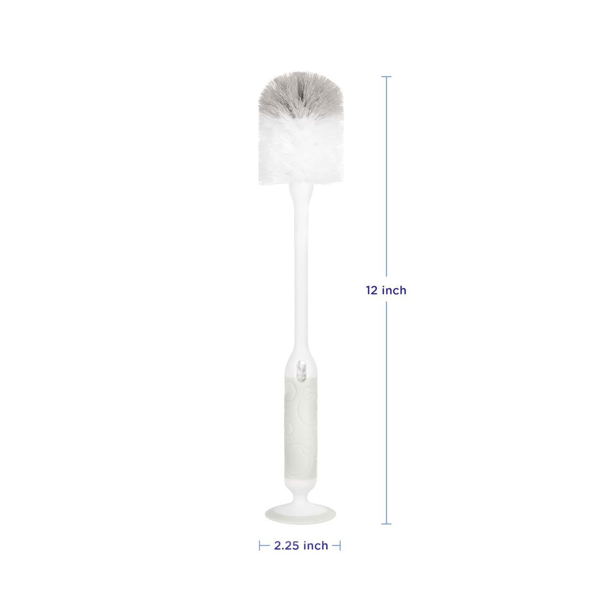 Ubbi bottle brush with suction cup base standing on counter