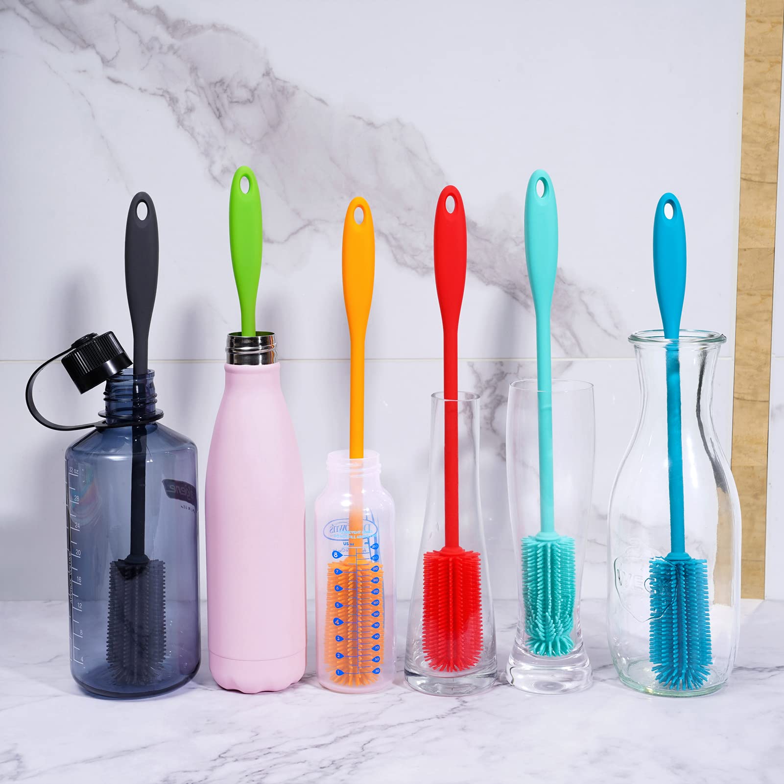 Charcoal silicone bottle brush hanging in kitchen