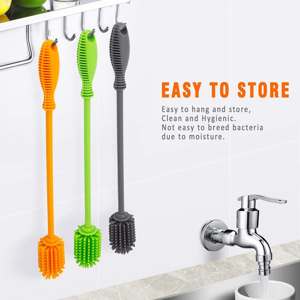 Long handle bottle cleaner reaching inside a glass bottle