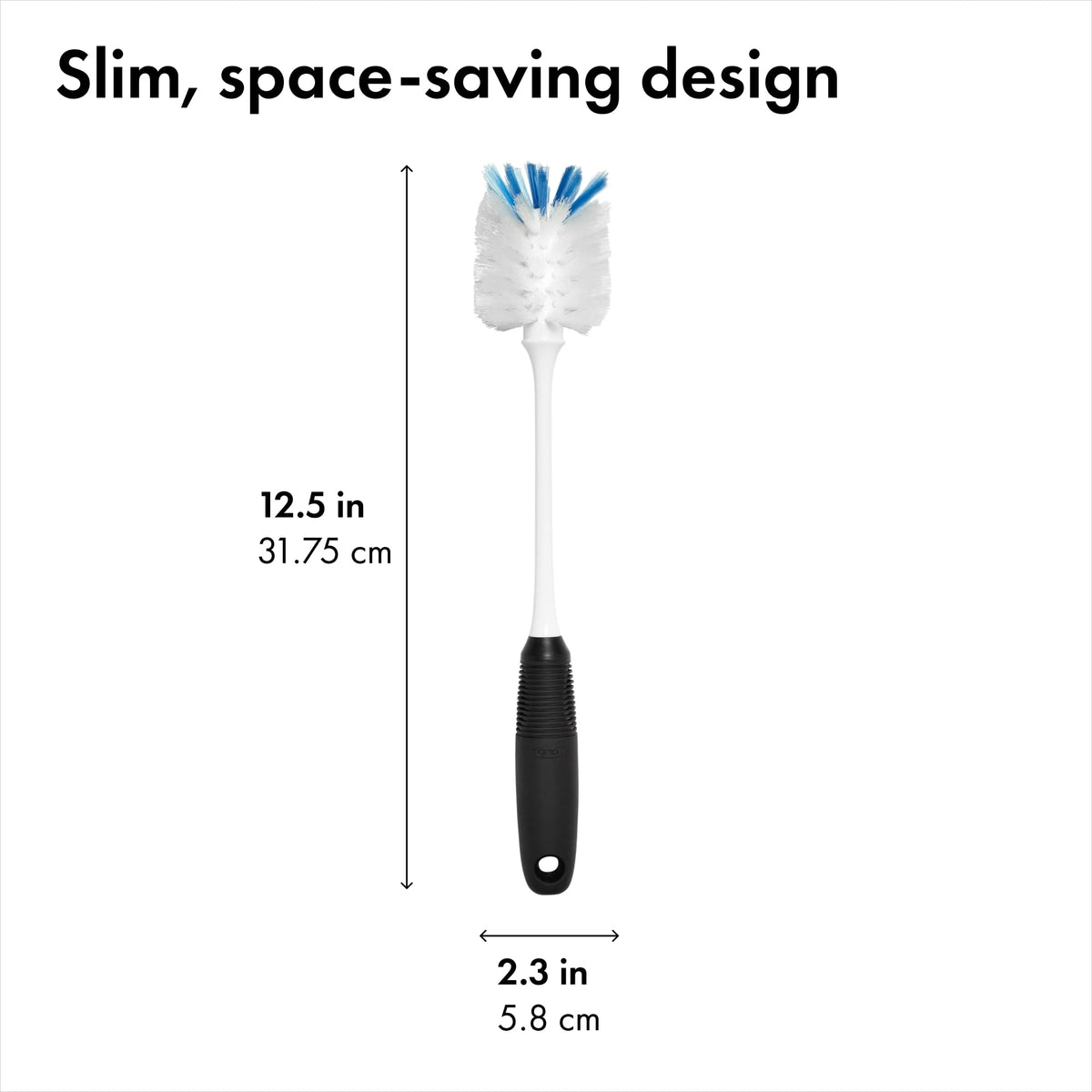 OXO kitchen brush resting on a drying mat