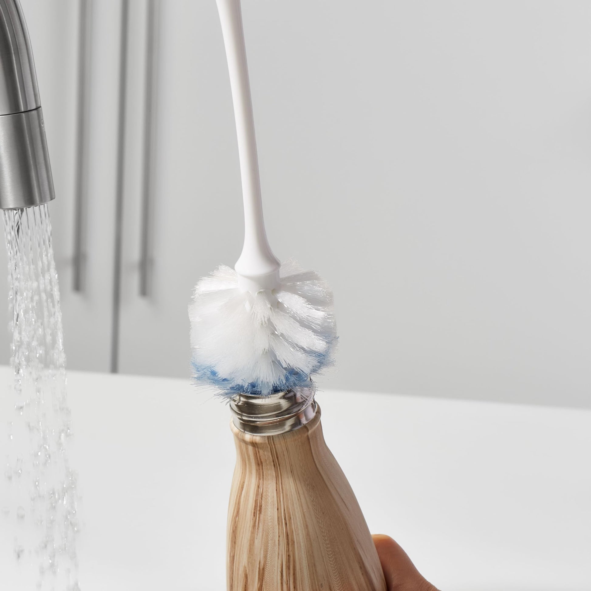 Detail of OXO non-slip handle grip for kitchen scrubbing