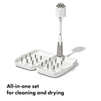 OXO Tot travel drying rack folded and compact in hand