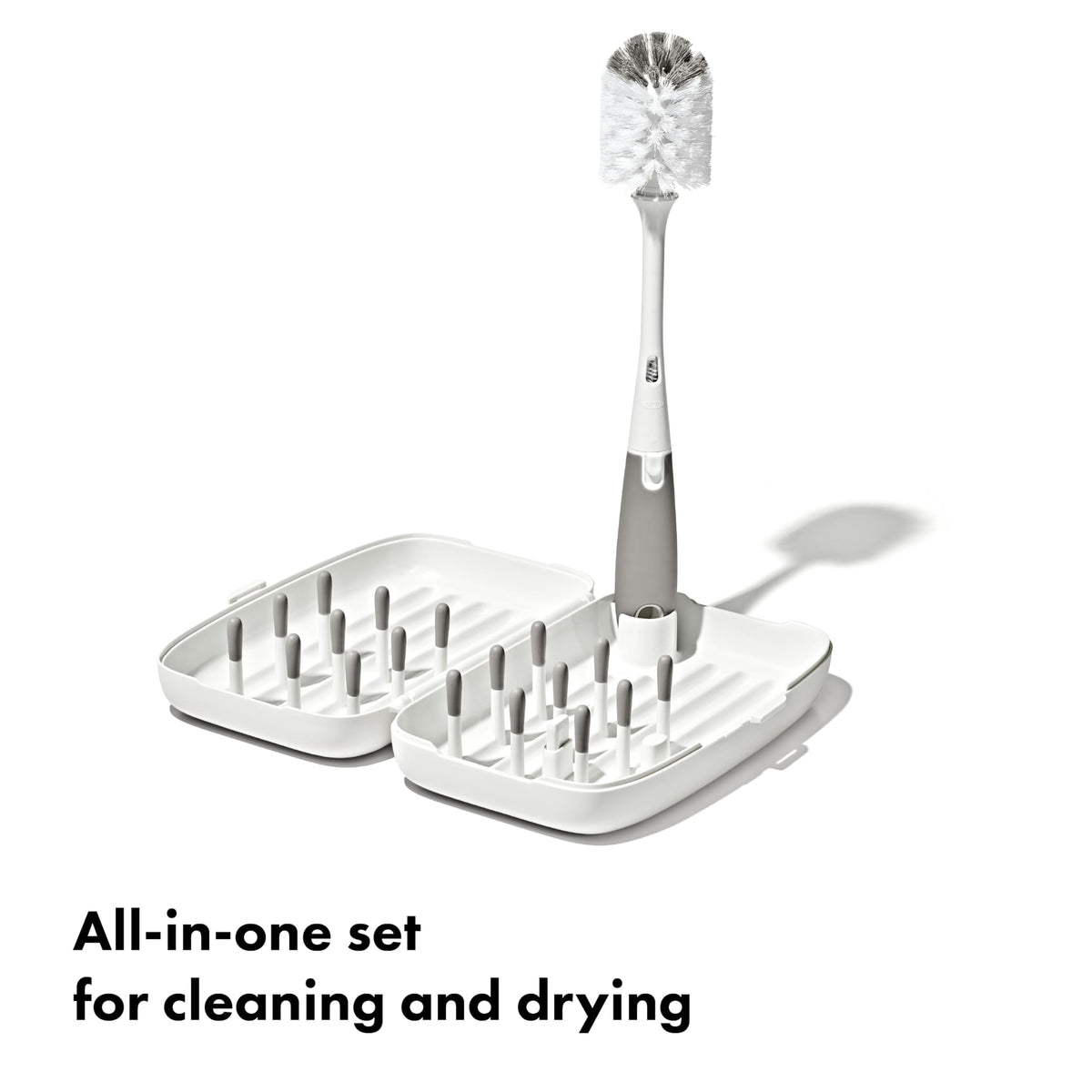 OXO Tot travel drying rack folded and compact in hand