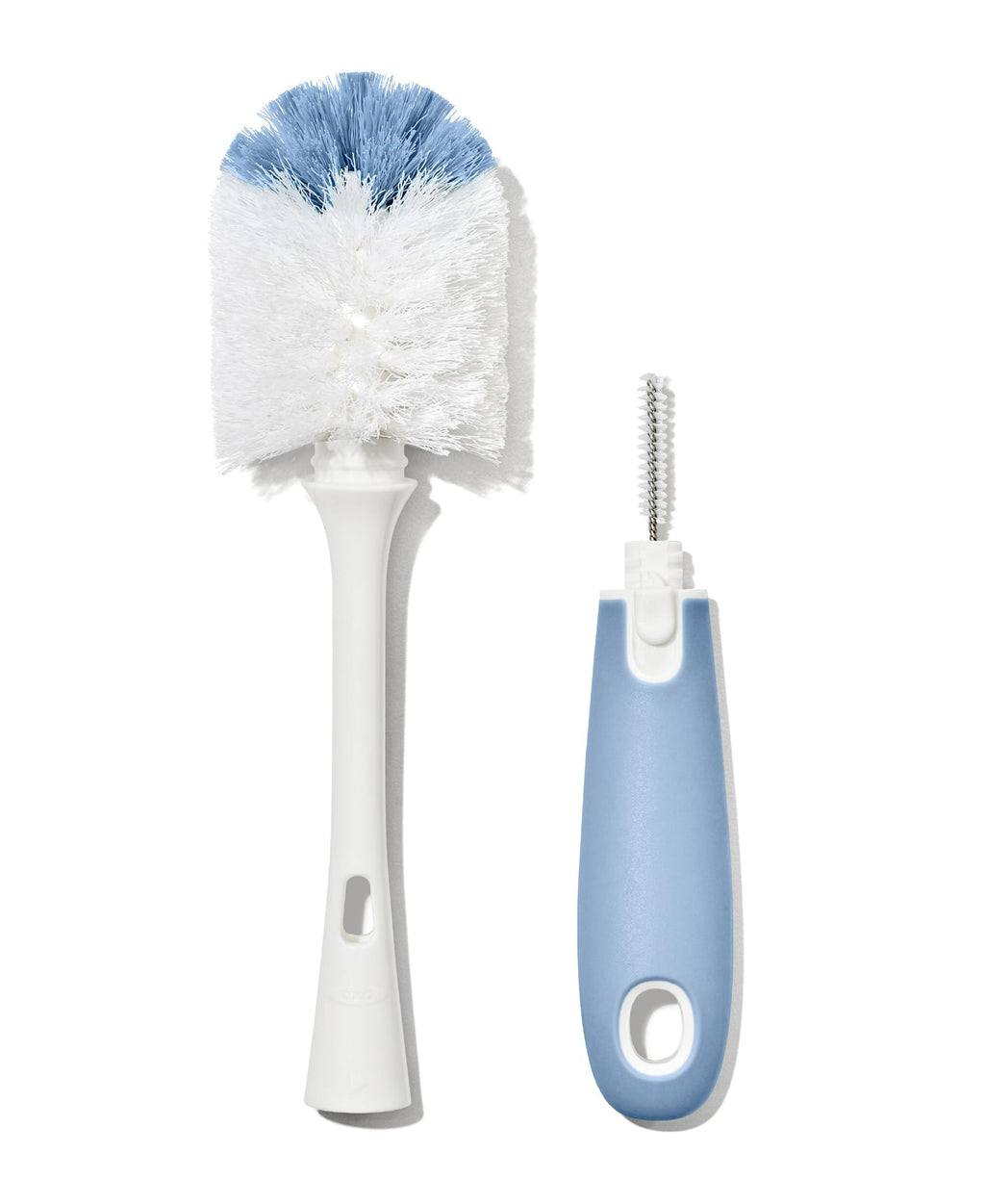 Ergonomic non-slip silicone handle of the OXO Tot cleaning brush