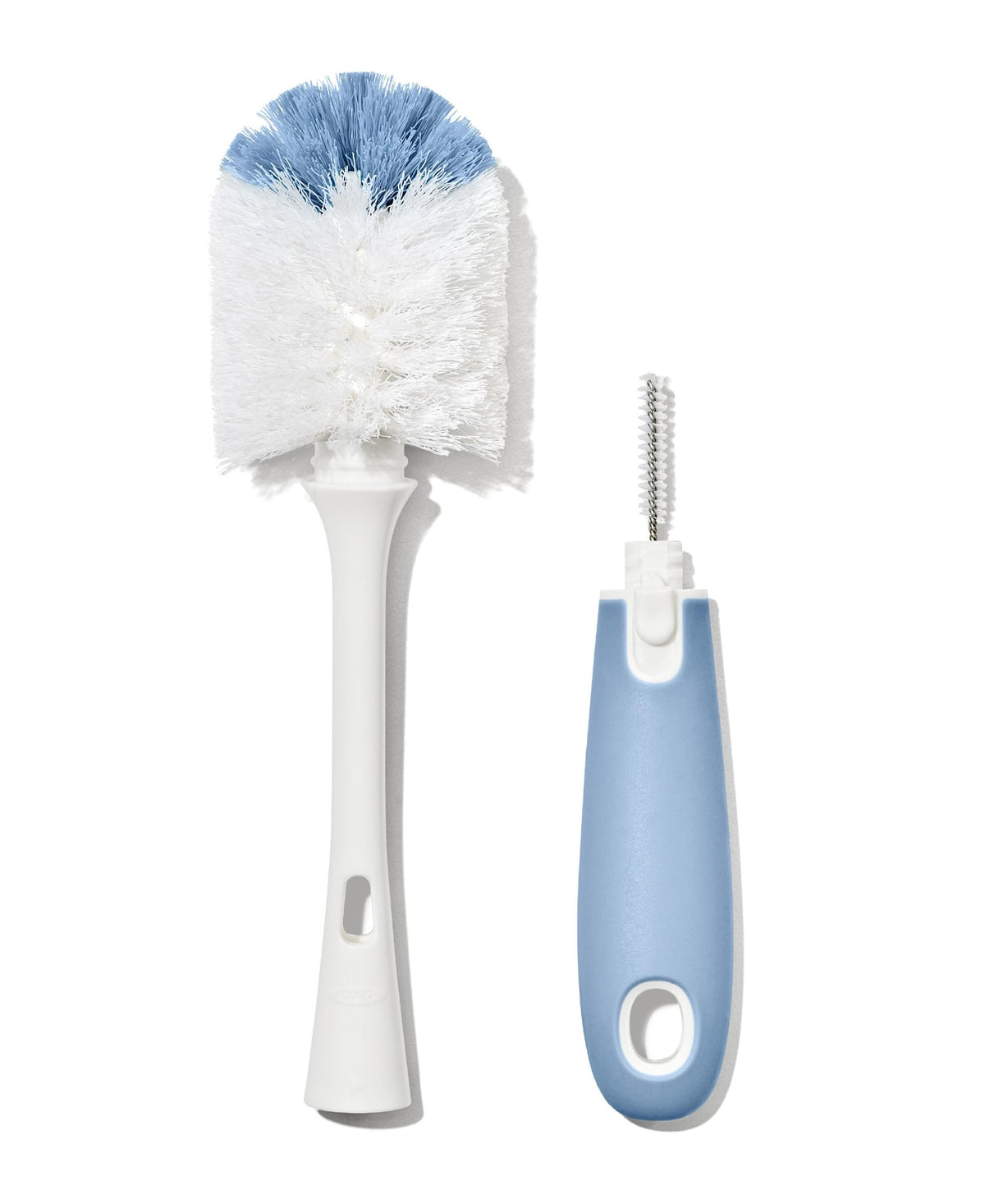 Ergonomic non-slip silicone handle of the OXO Tot cleaning brush