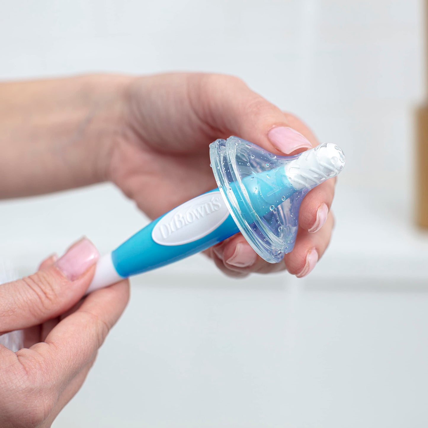 Packaging view of Dr. Brown's baby bottle cleaning brush