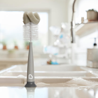 Munchkin sponge bottle brush standing upright on counter