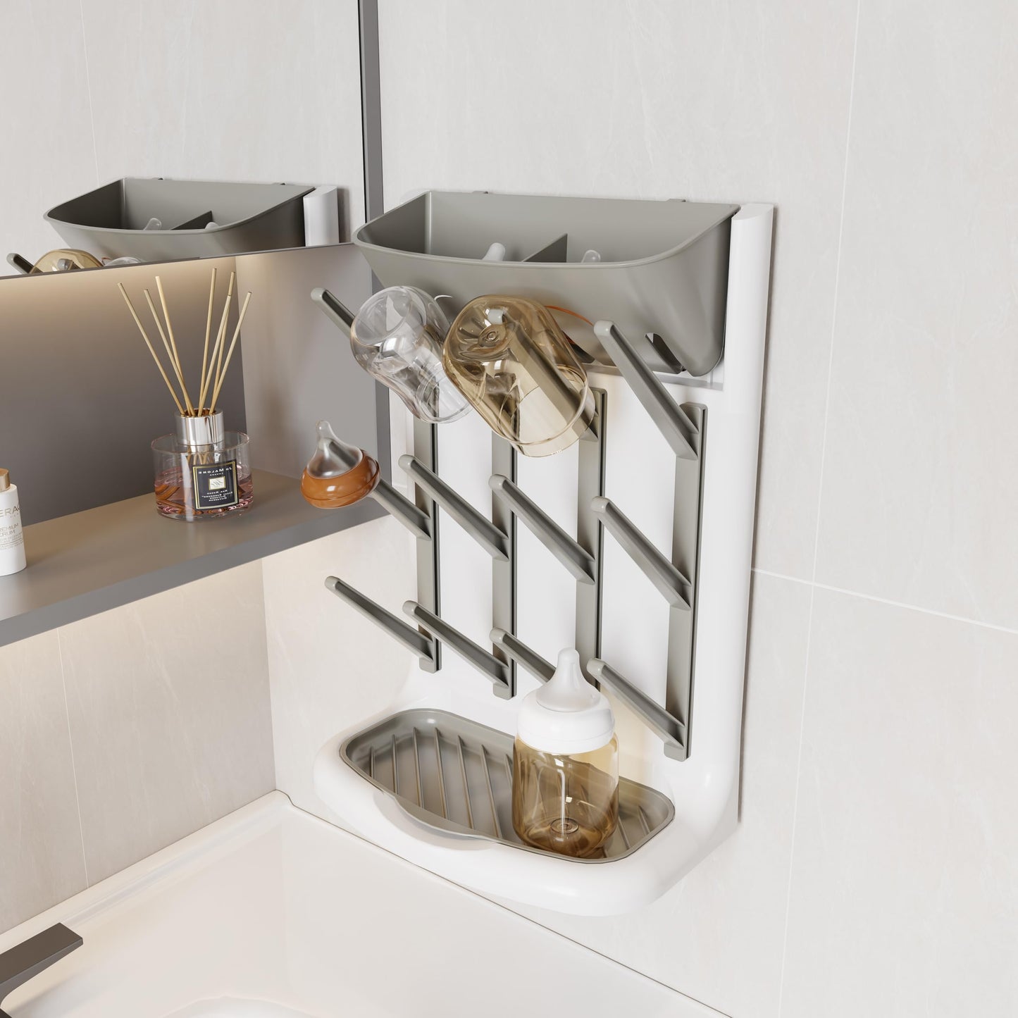 Ieek bottle drying rack showing removable top basket for nipples