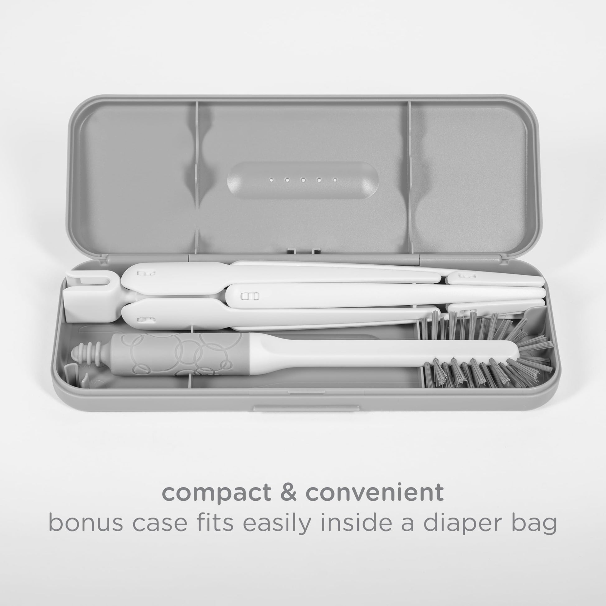 Ubbi bottle brush and integrated nipple brush components