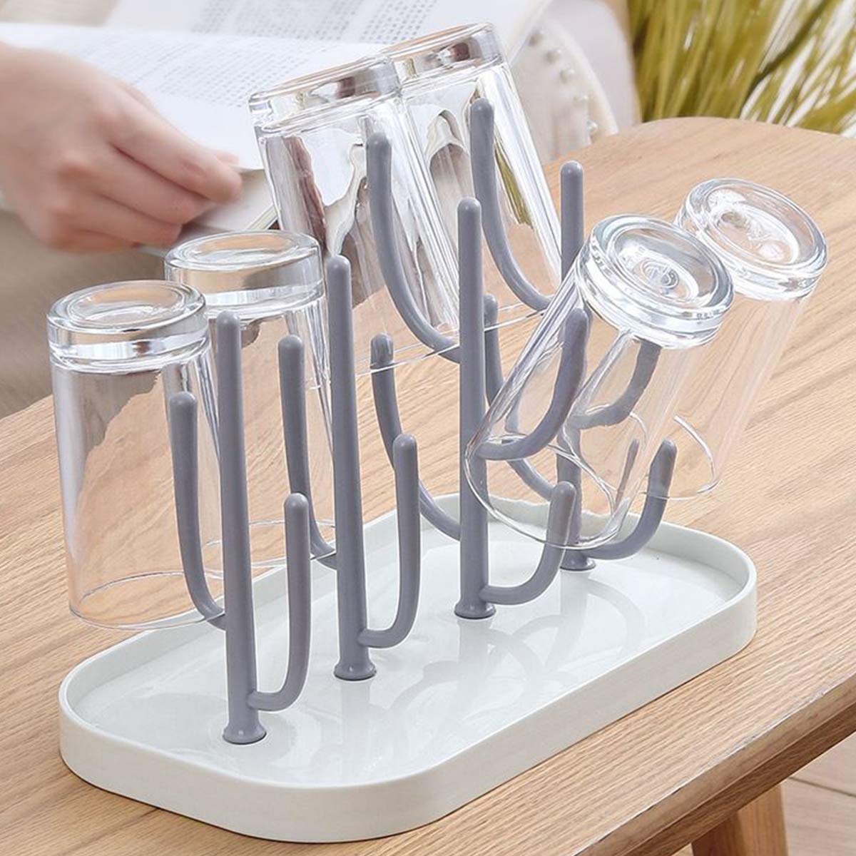 Adjustable tree branch drying rack holding baby bottles and pump parts
