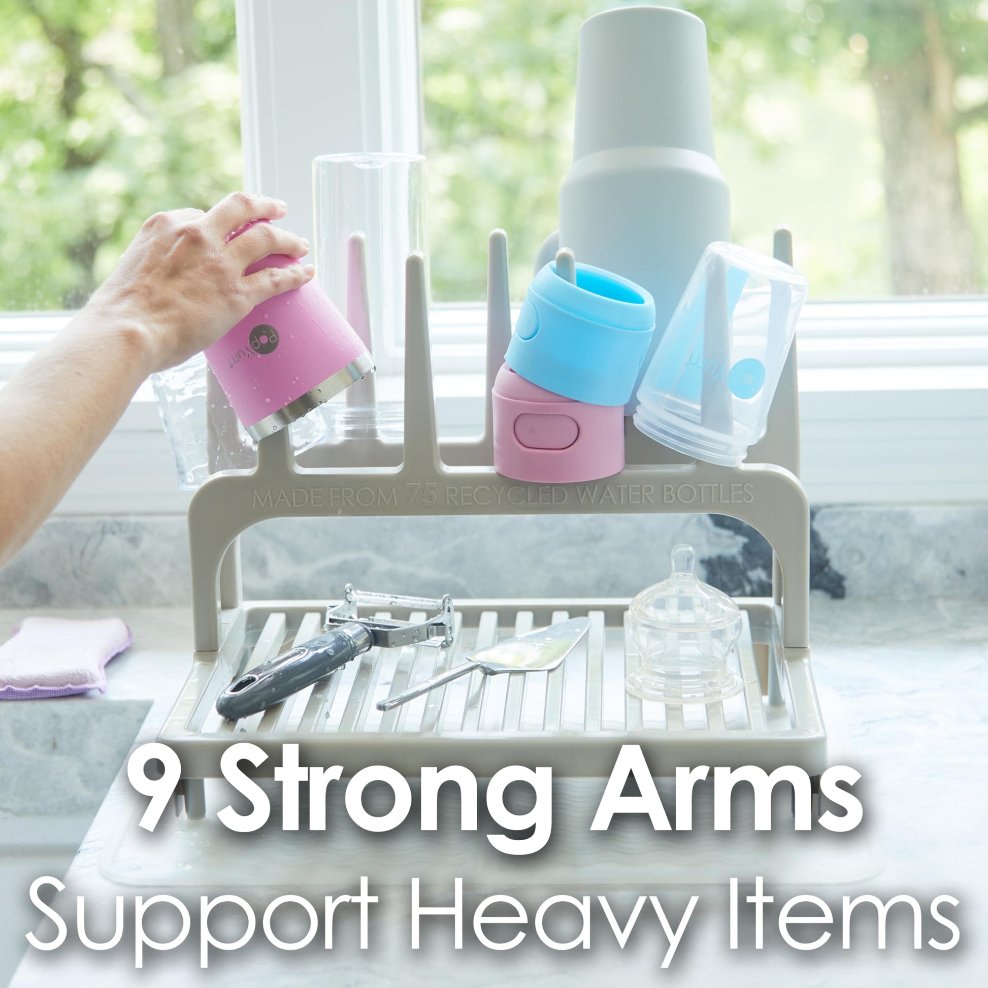PopYum drying rack with reusable plastic bags drying on arms