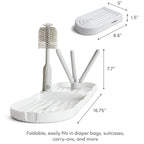 Munchkin drying rack showing water collection tray